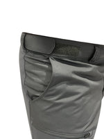 Close up of velcro adjustable waist on gray hiking trousers.