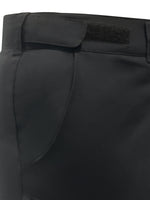 Close up of velcro adjustable waist of black hiking pants